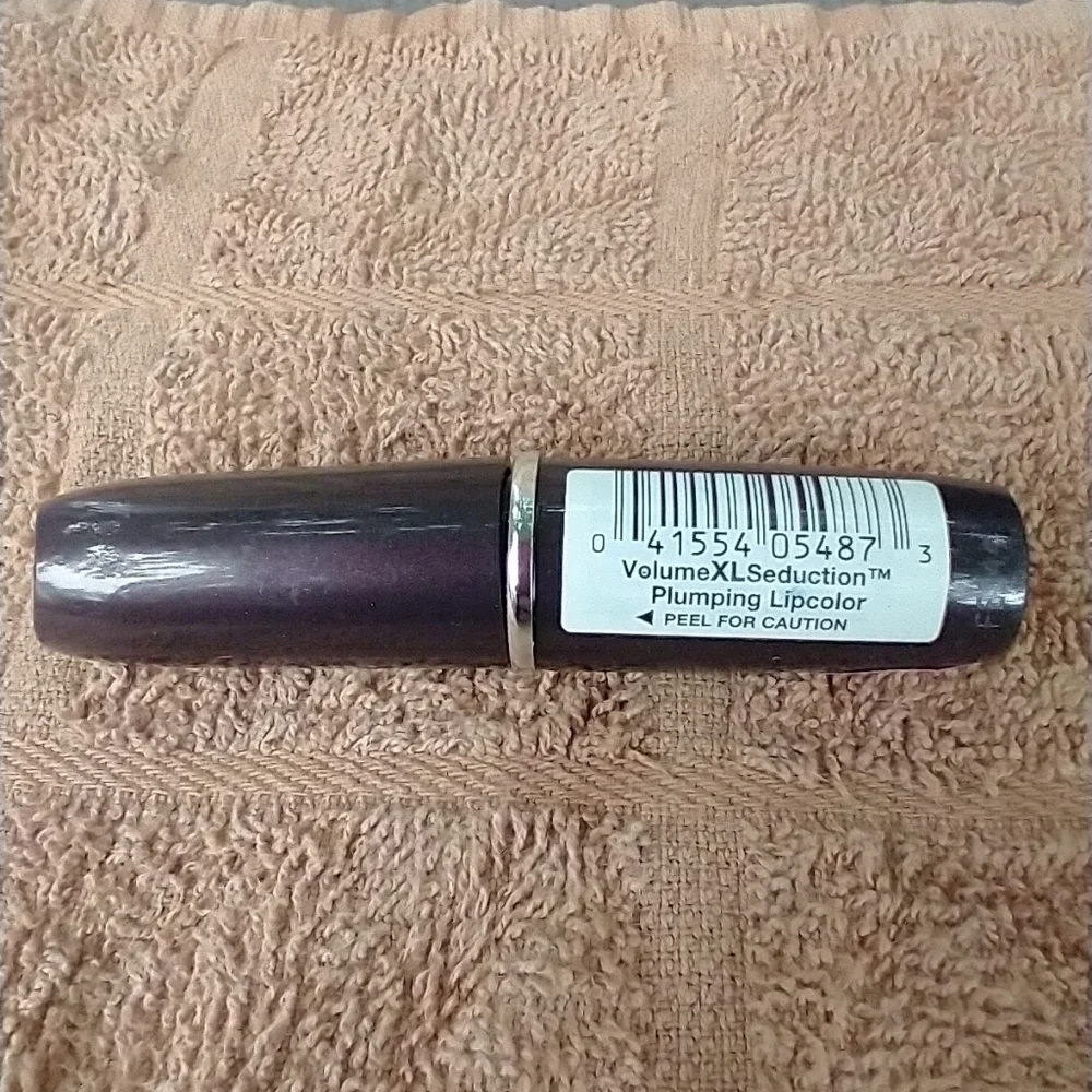 Volume xl seduction plumping lip color 120 peach p